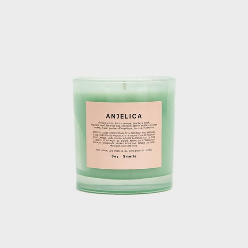Boy Smells Scented Candle in Anjelica